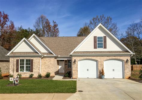 house colors to use with tan metal roof|tan brick exterior color schemes.